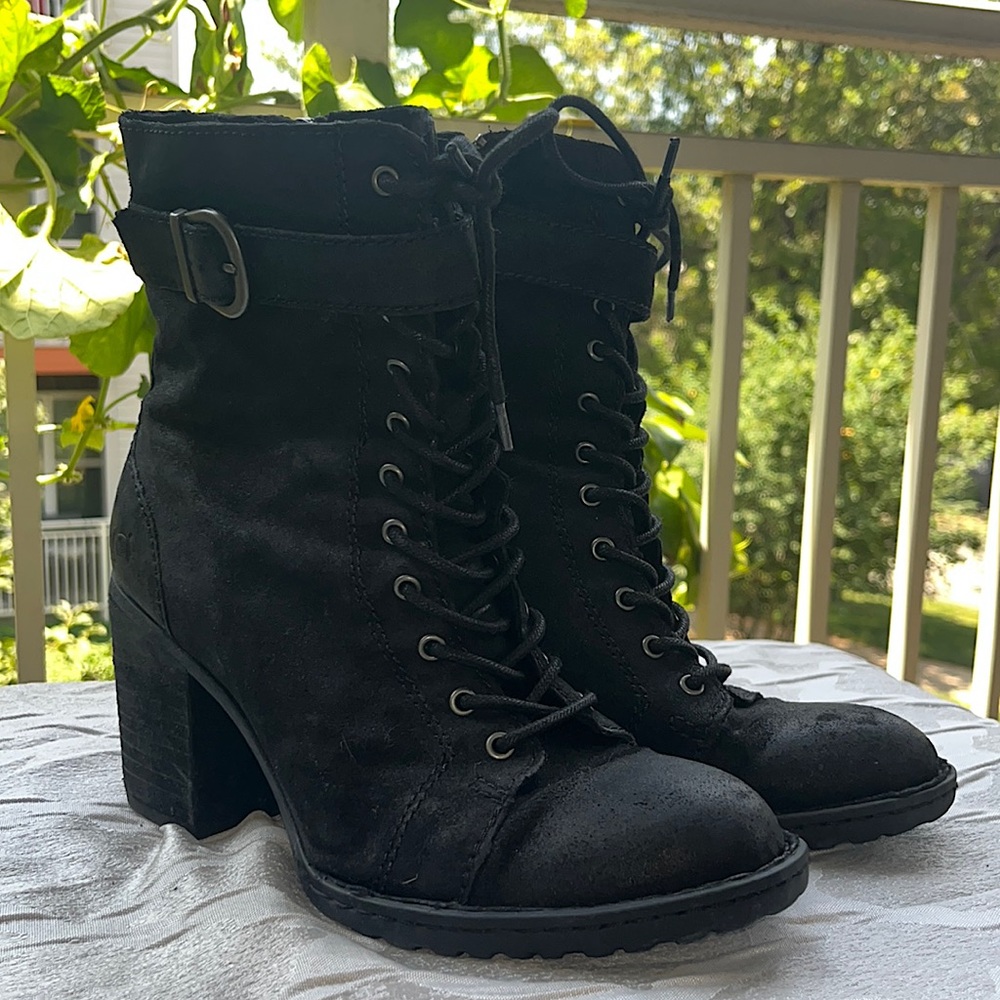 Black BORN boots. Has been lightly worn, but still fashionable acceptable!